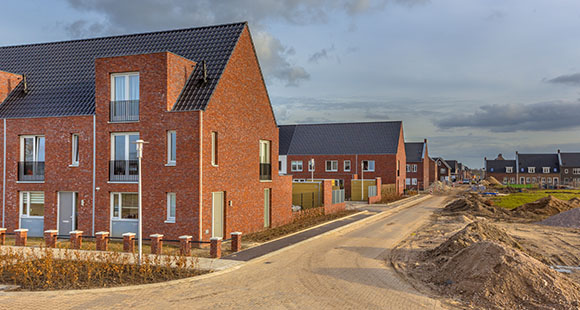 new build homes on a dirt road in a new residential district